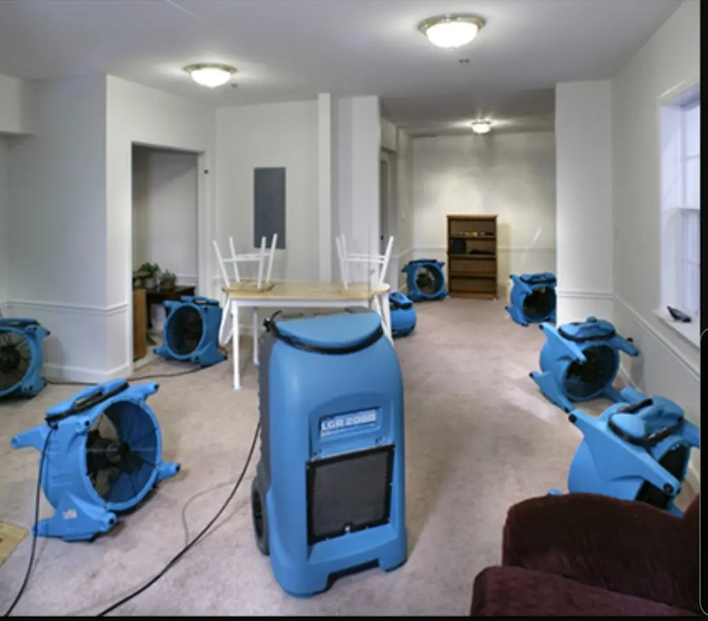 Air movers and dehumidifier setup for Water Damage Restoration in Parkwood